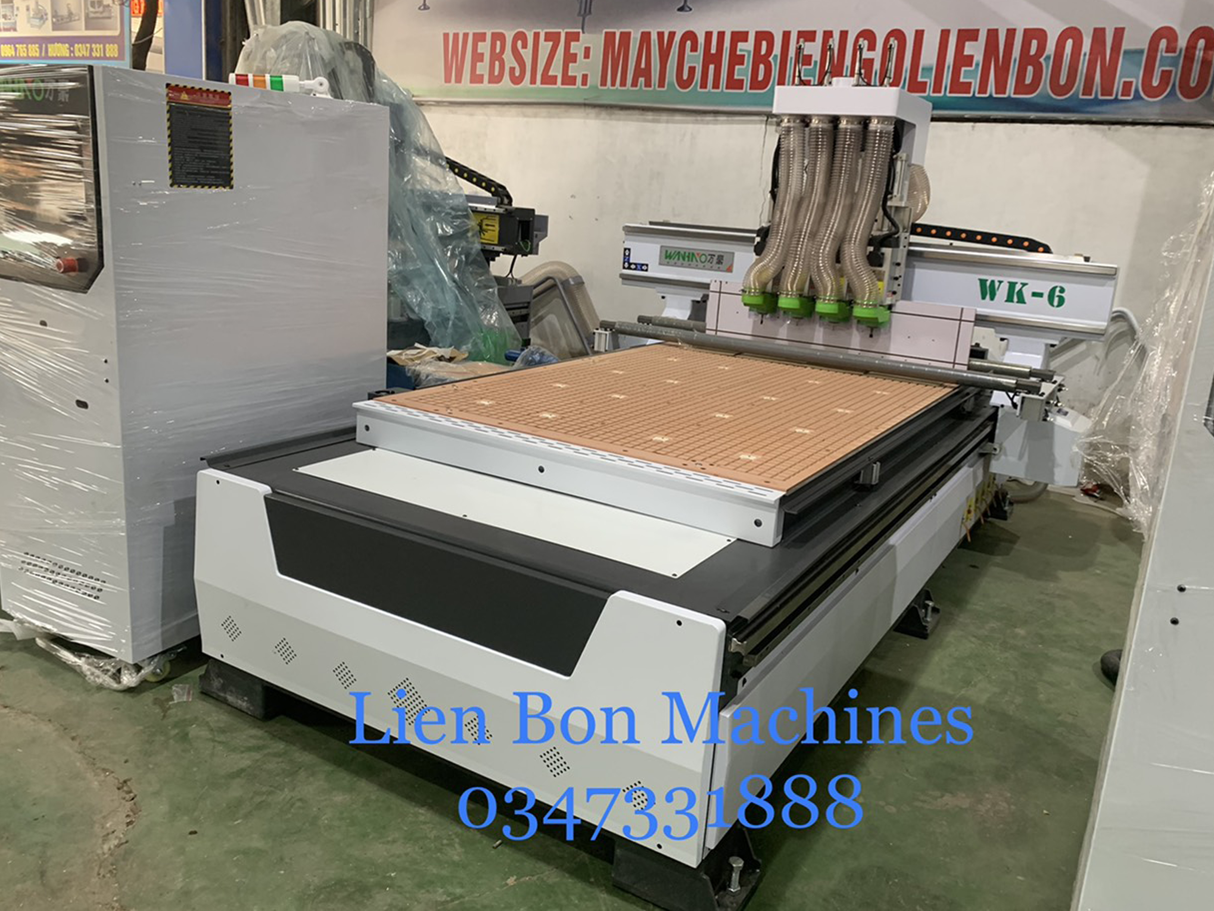 Máy CNC trung tâm 4 đầu WK-6 (cấp và ra phôi tự động)